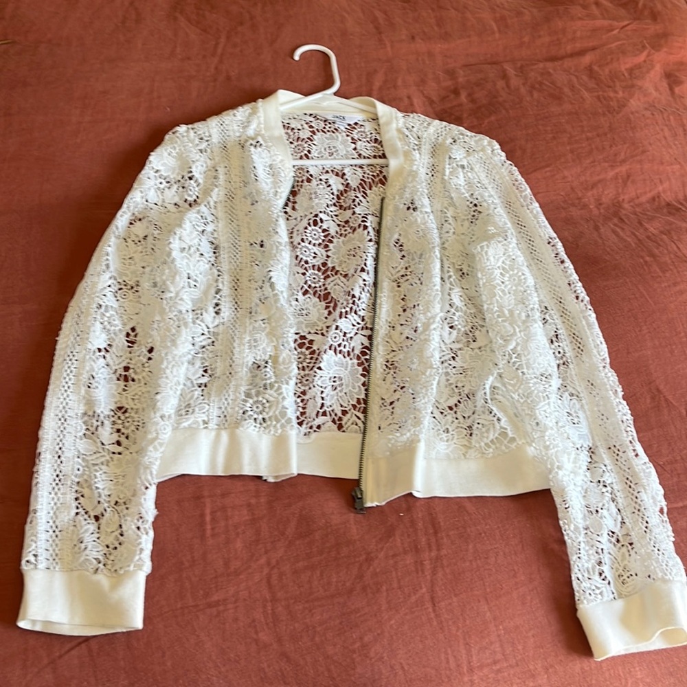 Embroidered white zip up